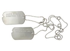 two metal tags with chains attached to them