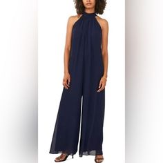 Vince Camuto Womens Navy Lined Zippered Sheer Tie Back Sleeveless Halter Wide Leg Jumpsuit. Navy Blue Size Small Elegant Sleeveless Strapless Jumpsuit For Beach, Elegant Blue Strapless Jumpsuit, Chic Blue Sleeveless Jumpsuits And Rompers, Blue Casual Evening Jumpsuits And Rompers, Casual Blue Jumpsuits And Rompers For Evening, Elegant Blue Sleeveless Jumpsuits And Rompers, Cream Jumpsuit, Hot Pink Romper, Chiffon Jumpsuit