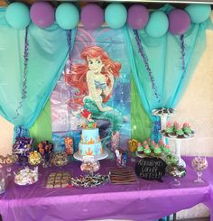 a little mermaid birthday party with cake and cupcakes