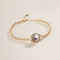 Material: 18K gold and Mabe Pearl Mabe Pearl saltwater cultured pearl Size of pearl: 12.0-13.0 mm Length of Chain: around 18.5cm (Adjustable) Handpicked of every pearl, only the top 1% of pearls are selected Handcrafted Lifetime warranty Beaded Chain Bracelet, Mabe Pearl, Akoya Pearls, Pearl Size, Beaded Chain, Chain Bracelet, 18k Gold, White Gold, Bracelet