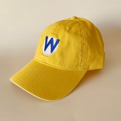 100 % Cotton. One size fits most with an adjustable buckle strap closure. Adult / Unisex Thick ,Soft , and light material. Very nice quality built hats with quality embroidery work Yellow Cotton Trucker Hat, Yellow Adjustable Baseball Cap With Curved Visor, Yellow Baseball Cap With Embroidered Logo, Yellow Cotton Snapback Baseball Cap, Yellow Cotton Dad Hat, Yellow Curved Brim Baseball Cap With Embroidered Logo, Yellow Cotton Baseball Cap With Curved Bill, Baseball Cap With Letter Patch, Adjustable Baseball Cap With Letter Patch