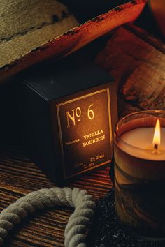 As each candle burns down it becomes a lantern illuminating the artwork printed on cherry wood. Fragrance: Sandalwood, Rose, Cinnamon, Patchouli and Maple Sugar; and enhanced with Orange Zest. -soy blend -100% cotton wick -60 Hour Burn -10 fl oz. -signature wood label on glass Glass Product Photography, Whiskey Candle, Bourbon Candles, Wood Labels, Cozy Candle, Vanilla Bourbon, Amber Candle, Maple Sugar, Cozy Nooks