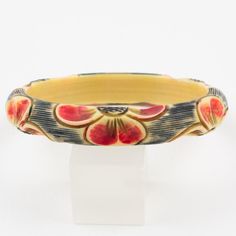 This is part of Chairish’s Costume Jewelry assortment.  Elegant 1925s Art Deco celluloid bracelet bangle. Features floral design, with six motifs all around the bracelet deeply carved, painted, and stained. A lovely range of assorted colors with off-white, black, and red. Measurements: Inside across is 2.63 in diameter (6.6 cm) - outside across is 3.19 in diameter (8.1 cm) - width is 0.50 in wide (1.3 cm) - inner circumference is 8.13 in long (20.5 cm). It will best fit a Medium to Large wrist, Handmade Bakelite Bracelets As Gift, Cartier Bangle, Modern Bangle, 18k Gold Bangle, Modern Bracelets, French Art Deco, Bracelet Bangle, French Art, Gold Bangles