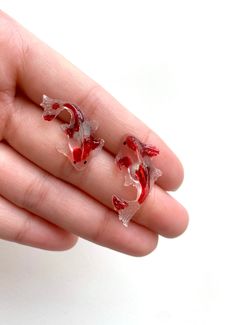 Handmade sculpted Koi Fish Earrings. All earrings are hand sculpted, casted and painted. One of the kind, made to order! Handmade Fish-shaped Earrings For Gifts, Fish Earrings, Sculpture Art Clay, Clear Earrings, Hand Painted Earrings, Painted Earrings, Handmade Earring, Bee Earrings, Daisy Earrings