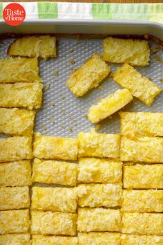 there are many pieces of food on the baking sheet and one is cut in half