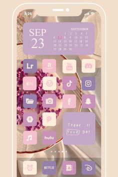 the calendar is displayed on an iphone screen with icons and symbols in purple, white and pink