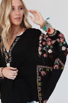 The beautiful and lightweight Frida Embroidered Dolman Sleeve Top is a must-have addition to your boho wardrobe! This top is perfect for days when you want to feel relaxed, yet put together because it features: Lightweight woven fabric Loose and flowy silhouette with slight high-low bottom edge (perfect for your leggings!) Flattering notched neckline Exaggerated Dolman long sleeves So pretty floral embroidery details throughout Your favorite boho outfit pair with: Eye Of The Sun Padded Bralette, Boho Wardrobe, Trendy Boutique Clothing, Womens Boho Tops, Dolman Sleeve Top, Three Bird Nest, Boho Outfit, Notched Neckline, Padded Bralette, Trendy Boutique