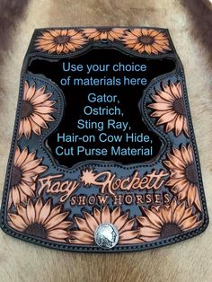 the back of a horse's saddle with an image of sunflowers on it