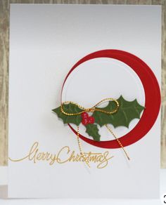 a christmas card with holly on it