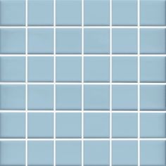 a blue tile wall with white squares on it and the bottom half is shown in light blue