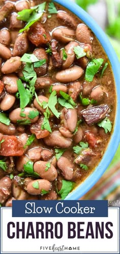 slow cooker chili beans in a blue bowl with cilantro