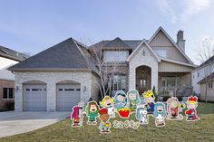 a group of cartoon characters standing in front of a house