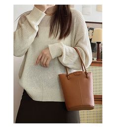 2023 New style. Simple leather bucket bag. Material: PU Leather Size: 7.5"H x 8.6"W x 4.3"D Extra crossbody strap Designer Style ID: 8561 Chic Bucket Leather Bag with Shoulder Strap and Inner Pouch, Women's Everyday Handbag Everyday Handbag, Simple Leather, Chic Leather, Leather Bucket Bag, Leather Bucket, Designer Style, Winter Sale, Crossbody Strap, Fashion Handbags