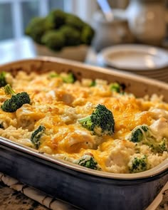 a casserole dish with broccoli and cheese