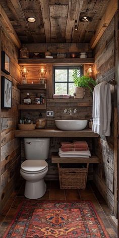 a bathroom with wood paneling and a rug on the floor in front of it