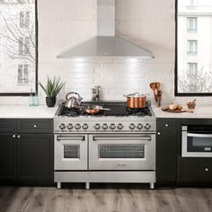 a stove top oven sitting inside of a kitchen