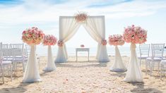 an outdoor wedding setup on the beach