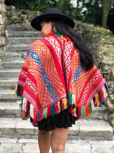 Color En la Calle: Authentic Vintage Peruvian Poncho, Traditional Ceremonial Poncho, 53x55 inches / Bohemian Textiles, Home Decor, Boho Fabric, South American Textiles / One of a Kind. If you look up to the hills of the Andean Mountains of Peru, you will find so much beauty, color, and tradition; a place that is so rich and vibrates with potency. Peru has blown my mind away with its culture, loving people and oh, the colorful textiles have my heart skipping a beat. This particular piece is one o Traditional One-size Cape For Festivals, Traditional Red One-size Poncho, Traditional Red Poncho For Festivals, Red Shawl Poncho For Festival, Red Folk Style Poncho For Festival, Traditional One Size Woven Poncho, Bohemian Red Shawl Cape, Bohemian Red Cape For Festivals, Red Bohemian Shawl Cape