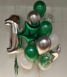 a bunch of balloons that are in the air