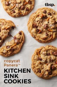 four cookies with chocolate chips and pecans on top