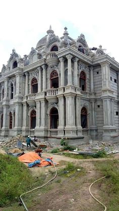 an old building is being renovated and put in place for the new roof to be installed