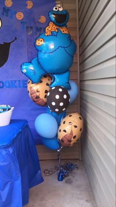 balloons are in the shape of sesame street characters