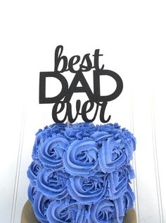 a blue cake with the words best dad ever on top