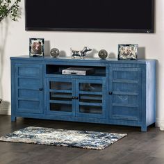 a blue entertainment center in a living room