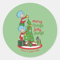 the cat in the hat christmas tree is on top of a green round sticker