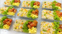 many plastic containers filled with food on top of a table