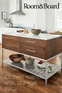 the kitchen island with storage is featured on the cover of the magazine room & board