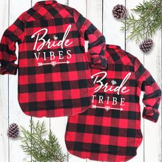 two red and black flannel shirts with the bride and groom names on them