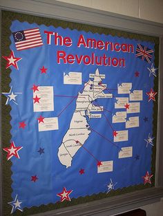 a bulletin board with the american revolution written in red, white and blue on it