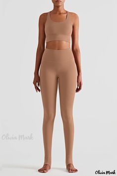 Olivia Mark - Womens Light Brown Solid Skinny High-Waisted Athletic Trousers with Intricate Cut-Out Design Beige Fitted Activewear For Yoga, Beige Fitted Yoga Activewear, Compressive Beige Yoga Bottoms, Beige Fitted Activewear For Pilates, Fitted Beige Activewear For Pilates, Fitted Beige Sports Pants, Fitted Beige Yoga Bottoms, Beige Fitted Pants For Sports, Fitted Beige Bottoms For Yoga