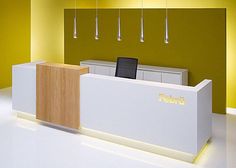 the reception desk is clean and ready to be used for an office or conference room