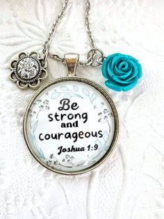 "Strength Necklace, Scripture Necklace, Bible verse necklace, Faith Necklace, Christian mom gift, Christian Necklace quote reads: \" Be Strong and Courageous. Joshua 1:9 \" Pendant size is 30mm round and is silver colour. it comes with a turquoise resin flower charm and a silver flower charm, as in the picture. The chains: -24 inches long cable chain -30 inches long  ball chain.  thank you, God bless you." Christian Mom Gifts, Bible Verse Jewelry, Turquoise Resin, Bible Verse Necklace, Scripture Jewelry, Necklace Christian, Faith Necklace, Necklace Quotes, Christian Necklace