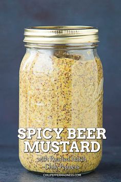 spicy beer mustard in a mason jar with text overlay that reads spicy beer mustard