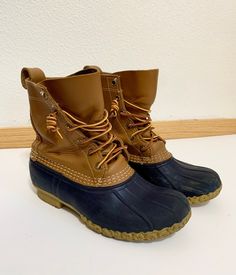 "Vintage 8\" L.L. Bean duck boots for woman with rubber soles and rubber and leather upper.A great all weather outdoor foot wear!  Made in Main, USA  size: US 6 woman-will fit 6-6.5(LLBean only makes whole sizes for their boots)  color: brown/navy blue  condition: great vintage, as pictures describe  Please let me know if there are any questions, thank you!" Insulated Round Toe Rain Boots For Walking, Insulated Work Boots For Outdoor Fall Use, Insulated Rain Boots For Walking, Insulated Moc Toe Boots For Walking, Fall Outdoor Rain Boots With Rubber Sole, Brown Waterproof Rain Boots For Outdoor, Hiking Boots With Rubber Toe Cap, Outdoor Boots With Rubber Toe Cap And Round Toe, Brown Insulated Walking Boots