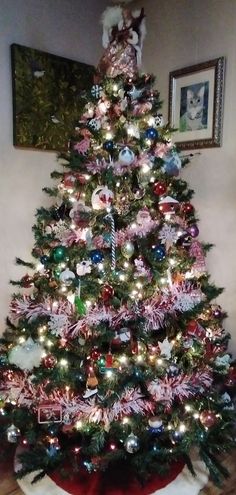 a decorated christmas tree in a living room