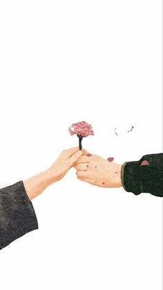 two people reaching out to each other with flowers in their hands