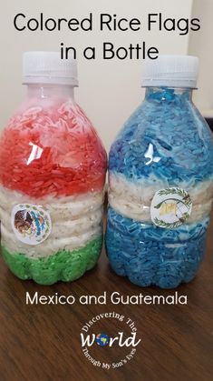 two plastic bottles with rice in them sitting on a table next to each other and the words colored rice flags in a bottle