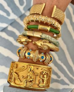 Egypt Is A Great Destination For Shoppers, With Its Bustling City Markets Full Of Unique Local Items. Discover Best Things To Buy In Egypt! Maximalist Gold Bracelets, Egypt Gold Jewelry, Egyptian Gold Jewelry, Ancient Egypt Jewelry, Spring Jewelry Trends, Egyptian Bracelet, Middle Eastern Jewelry, Egyptian Gold, Best Things To Buy