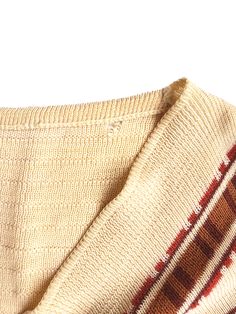 Details: Authentic 70's fitted sweater Fits like a Women's Small Small hole at shoulder on the back (see image 4 for details) Retro Cotton Sweater For Fall, Retro Cotton Beige Sweater, Retro Beige Cotton Sweater, Retro Cotton Sweater Vest For Fall, Retro Fall Sweater, Retro Beige Knit Sweater, Vintage Long Sleeve Stretch Sweater, Retro Stretch Knit Sweater, Retro Knit Stretch Sweater