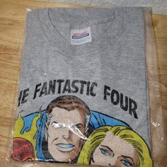 Marvel Fantastic 4 Graphitti T-Shirt Vtg Jack Kirby Sealed Package Y2k Small 234 Rare Colorway With A Gray Base Shirt. ** Last Image Is An Example Of The Full Graphic, And That Photo Is Not Of My Item. This Photo Was Taken From User: Molosblak's Sold Listing. My Shirt Is Sealed And Has Never Been Removed From Its Original Plastic. Brand: Graphitti Designs Size Tag: S Fabric Content: 100% Cotton Condition: New Sealed In Package. Measurements Not Availed. Style Tags: Vintage, 90s, Rare, Y2k, Graph Fantastic 4, My Shirt, Jack Kirby, Kirby, Vintage Shirts, Size Tag, Vintage Men, Vintage 90s, Blue Grey