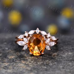 9x7mm Citrine wedding ring,citrine engagement ring,moissanite promise ring,bridal ring,moissanite ring,rose gold ring set ITEM SPECIFICATIONS:  Citrine engagement ring: Main stone:9x7mm oval cut natural citrine Accent stone:with marquise cut moissanite (diamond is available,please contact us if you need) Band width:approx 1.5mm Setting:prongs and pave set Matching band: Stone:with marquise cut moissanite (diamond is available,please contact us if you need) Band width:approx 1.5mm Setting:prongs Orange Topaz Wedding Ring, Amber Wedding Ring, Orange Engagement Ring, Amber Engagement Ring, Citrine Wedding Ring, Rosegold Ring, Citrine Engagement Ring, Citrine Wedding, Citrine Ring Engagement