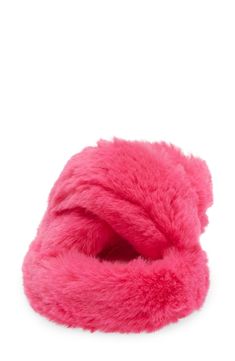 Plush faux fur straps and a footbed envelop your feet in comfort, allowing you to lounge in style. Polyester faux fur upper and lining/rubber sole Imported Trendy Winter Slippers With Faux Fur Lining, Winter Slippers With Plush Lining And Faux Fur, Soft Faux Fur Winter Slippers, Pink Faux Fur Slippers For Winter, Pink Faux Fur Winter Slippers, Fluffy Faux Fur Slippers For Winter, Casual Faux Fur Lined Slippers, Casual Faux Fur Slippers, Winter Faux Fur Slippers With Scuffs