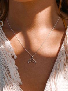 Looking for a piece of jewelry that stands out? This stunning silver fish tail necklace is perfect for those who are drawn to the mysteries of the sea. Its elegant design captures the graceful motion of the ocean, making it an ideal accessory for free spirits and ocean lovers. Whether you're channeling your inner mermaid or simply want something that feels truly one-of-a-kind, this necklace will add a touch of underwater magic to your style. Don't miss out on this rare catch! Mermaid Tail Necklace, Dolphin Tail, Wave Jewelry, Nautical Necklace, Fish Necklace, Fish Tail, Charm Necklace Silver, Mermaid Necklace, Accessories Jewelry Necklace