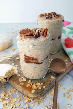 two mason jars filled with oatmeal and pecans