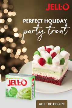 a piece of jello cake on a plate next to a box of jello