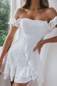 White mini dress Lined Lace overlay throughout Fabric has stretch Boning in bust Ruffle trim detail and hem Off-shoulder style Gel tape along inside of bust Invisible zipper in back You'll feel like you've been swept up in your own romance novel in our gorgeous Verona dress. Perfect for a bridal shower or birthday soiree, we are head over heels for its off-shoulder frill sleeves and stunning lace overlay. Team it with nude heels and a chic clutch for a look that is sure to turn heads. MODEL INFO Fitted Off Shoulder Mini Dress With Ruffles, One-shoulder Fitted Mini Dress With Ruffle Hem, Fitted Off-shoulder Mini Dress With Ruffles, Fitted One-shoulder Mini Dress With Ruffle Hem, Fitted Off-shoulder Dress With Ruffle Hem, Off-shoulder Mini Dress With Ruffles, Sleeveless Off Shoulder Dress With Ruffle Hem, Fitted One-shoulder Off-shoulder Dress With Ruffle Hem, White One-shoulder Mini Dress With Ruffle Hem